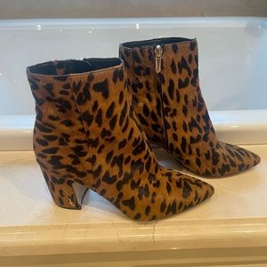 Calf hair leopard print boots.